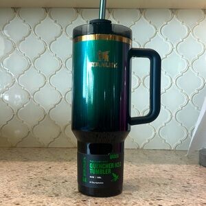 Black and Green Stanley X Wicked 40z Quencher Tumbler.